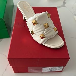 Valentino Garavani Rockstud Slides. New. In box. Dust covers. Size 39 1/2.
